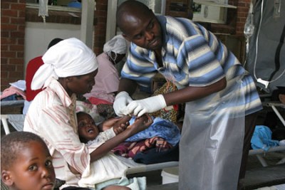 A nurse taking care of a cholera patient (file photo).