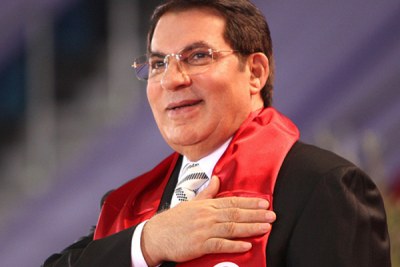 Le Président déchu de la Tunisie, Zine El Abidine Ben Ali, souriant sur cette photo, mais dont la traque des biens qu'il a eu à spolier s'organise de plus belle