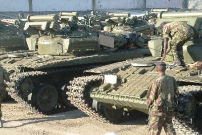 Military officers inspect tanks offloaded in Sudan (file photo).