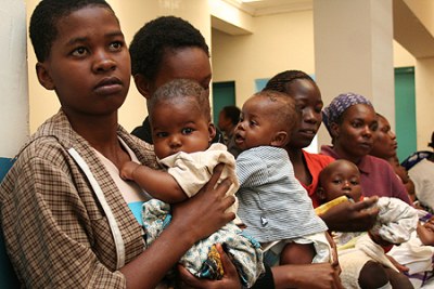 Mothers queue at a health centre for child immunisation. The World Bank report cites drugs being stolen from public clinics and sold to private markets as a new form of graft hurting development. Photo/FILE