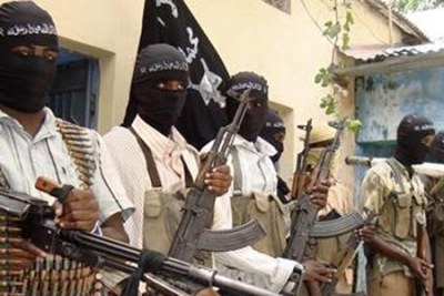 Islamist insurgents (file photo) pose with their weapons for the media in Somalia's capital Mogadishu.