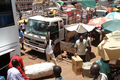 Ugandan vehicles loaded with goods en route to Sudan.