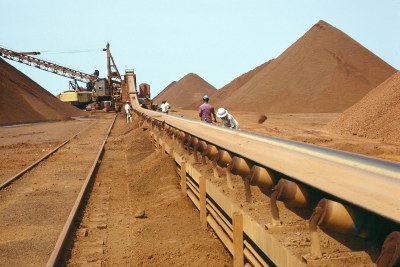 Newly mined iron-ore ready to be transported to the deep-sea-port at Monrovia for export.