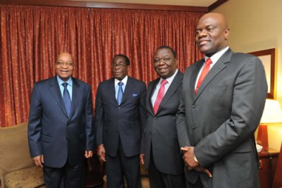 President Jacob Zuma of South Africa with, from left, President Robert Mugabe, Prime Minister Morgan Tsvangarai and Arthur Mutambara.