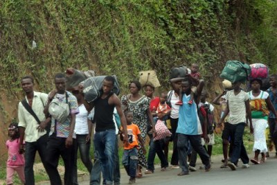 Refugees fleeing fighting in Cote d'Ivoire (file photo).