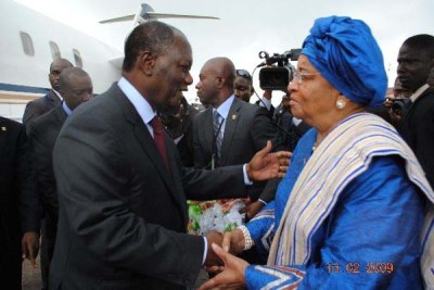 Ivorian President Alhassan Ouattara arrives for a meeting of Mano River Union leaders.
