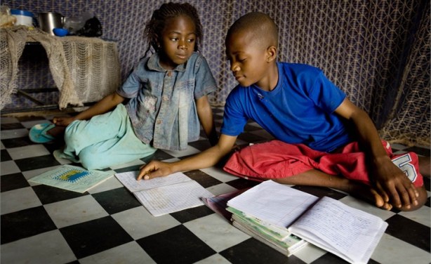 Image result for nigerian children doing homework