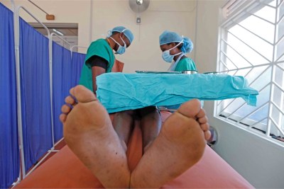 Medical male circumcision in progress