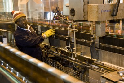 Johannesburg, Gauteng. Robertson Hlatshwyo works in the labelling plant at South African Breweries' Alrode brewery.