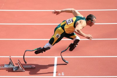 South Africa's Oscar Pistorius made history when he joined the men's 400m heats as the first amputee to take part in an Olympics track event.