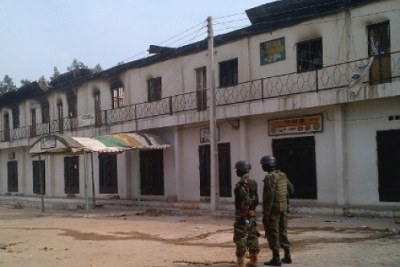 Soldiers on patrol at blast scene in Maiduguri.