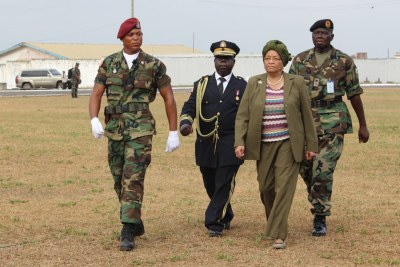 President Sirleaf inspects the troops (file photo).