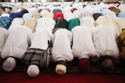 Muslims at prayer.