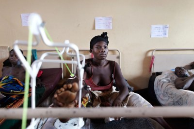 Bangui Community Hospital. 17 February 2014. A young woman in therapy to recover mobility after being wounded in a grenade explosion.