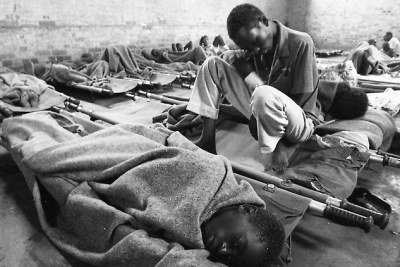 Civilians wounded during the genocide recover in a makeshift hospital in the Sainte Famille church in Kigali, Rwanda (file photo).