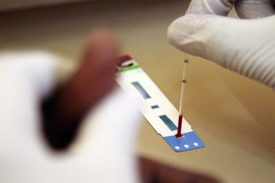 A health worker conducting a voluntary HIV test (file photo).