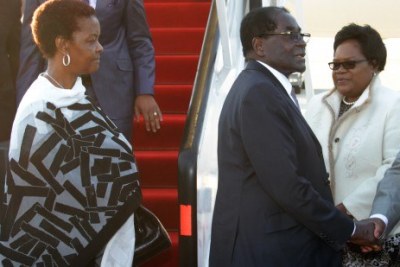 Grace Mugabe  and President Robert Mugabe arrive at the Harare International Airport.