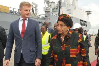 President Ellen Johnson Sirleaf escorted by the Ambassador of the Kingdom of Netherlands,  Hans Docter on a guided tour of the Karel Doorman, the Dutch naval vessel.