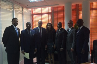Amb Abdulkadir A. Musa, Permanent secretary, Ministry of Trade and Investment (3rd from right) with GE team after signing the funding agreement with the five local banks