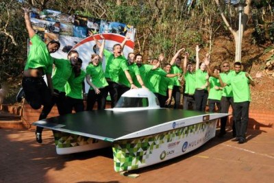 Students at the University of KwaZulu-Natal in South Africa show off the Hulamin solar car at its launch.