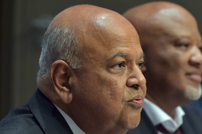 Finance Minister Pravin Gordhan briefs media ahead of the Budget Speech. Minister Pravin Gordhan, Deputy Minister Mcebisi Jonas and Reserve Bank Governor Lesetja Kganyago during the pre-Budget speech media briefing at Imbizo Centre in Parliament.