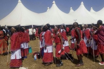 Members of the Narok County Assembly choir rehearse at the funeral.