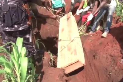 Burial of Kasese clashes victims by Ugandan police.