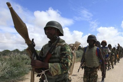 African Union Mission in Somalia (AMISOM) peacekeepers from Burundi patrol after fighting between insurgents and government soldiers on the outskirts of Mogadishu (file photo).