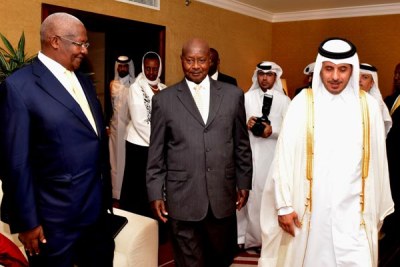 Visiting. President Museveni and the First Lady Janet being received by His Highness Sheikh Tamim bin Hamad Al Thani (right), the Amir of the state of Qatar at his residence (Emir Dewani). Left is Mr Sam Kutesa, the Minister of Foreign Affairs.