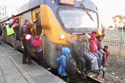 Commuters climbing on a Khayelitsha-bound train: According to the TomTom traffic index Cape Town is the most congested city in the country and 48th in the world, ahead of cities such as New York.