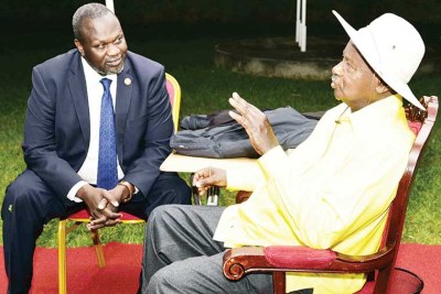 Reik Machar with Uganda President Yoweri Museveni.