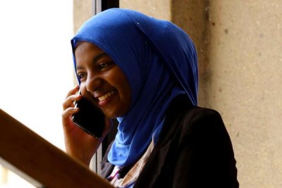 A woman making a phone call (file photo).