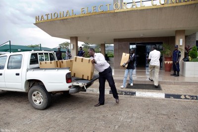 National Electoral Commission staffers load voters kits on a truck during a past election.