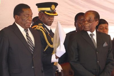 President Emmerson Mnangagwa (left) and former president Robert Mugabe (file photo).