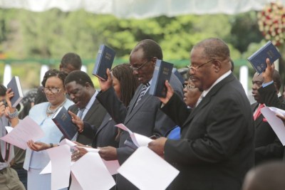 Cabinet ministers take their oath of office before President Emmerson Mnangagwa in 2017 (file photo).