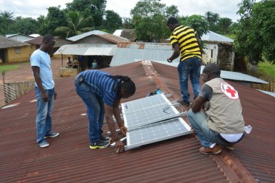 Solar light installation in Bomi County.