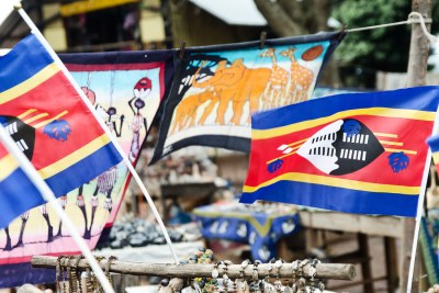 Swaziland flag among curios for sale.