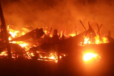 Flames raze a section of Korogocho market in Nairobi.