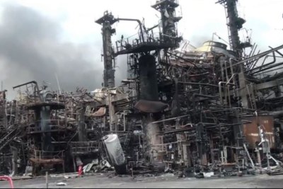 The remains of a Cameroon refinery in Limbe are seen after an explosion shook the facility over the weekend, June 2, 2019.