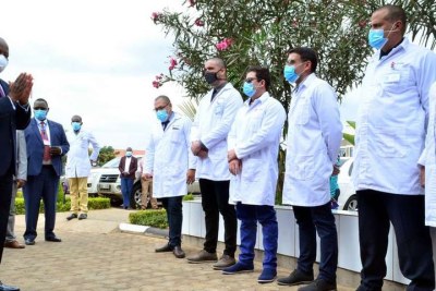 Health Cabinet Secretary Mutahi Kagwe addresses some of the 20 Cuban doctors stationed at the Kenyatta University Teaching, Referral and Research Hospital during the launch of the hospital’s Infectious Disease Unit (IDU) and Intensive Care Unit (ICU) on August 5.