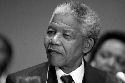 Nelson Mandela, alors président de l'African National Congress, lors d'une conférence de presse au siège de l'ONU à New York en décembre 1991.