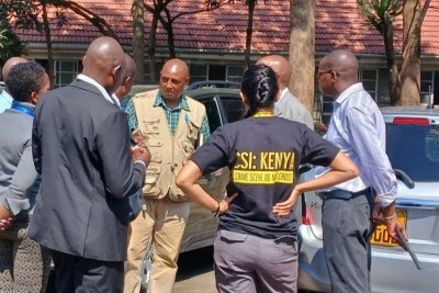 Kenya's Director of Criminal Affairs, Martin Nyuguto (center), briefing his team last month.