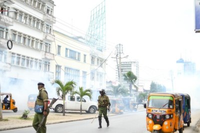Police used teargas to disperse anti-government protesters on Moi Avenue in Mombasa.